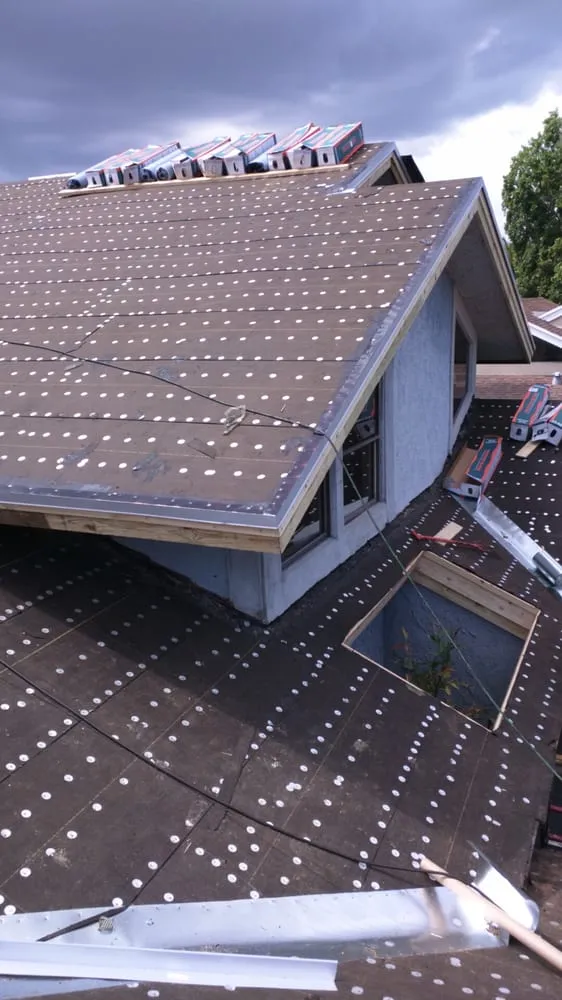 Slide of Riggs Roofing