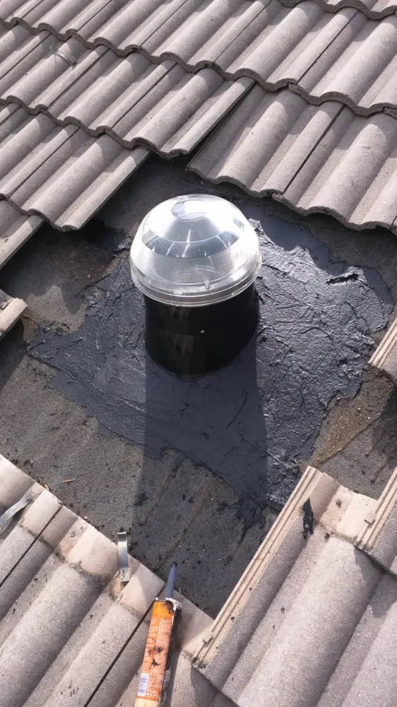 Slide of Riggs Roofing