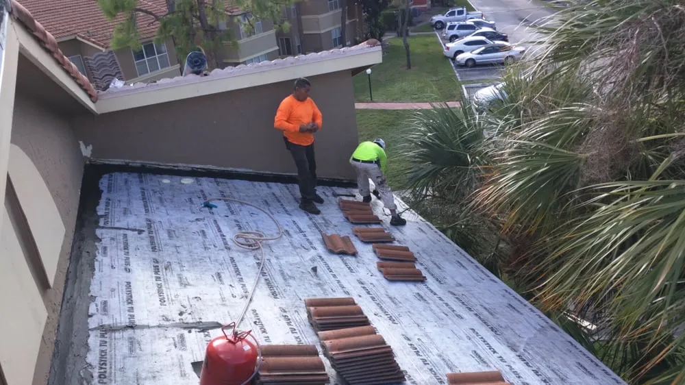 Slide of Riggs Roofing