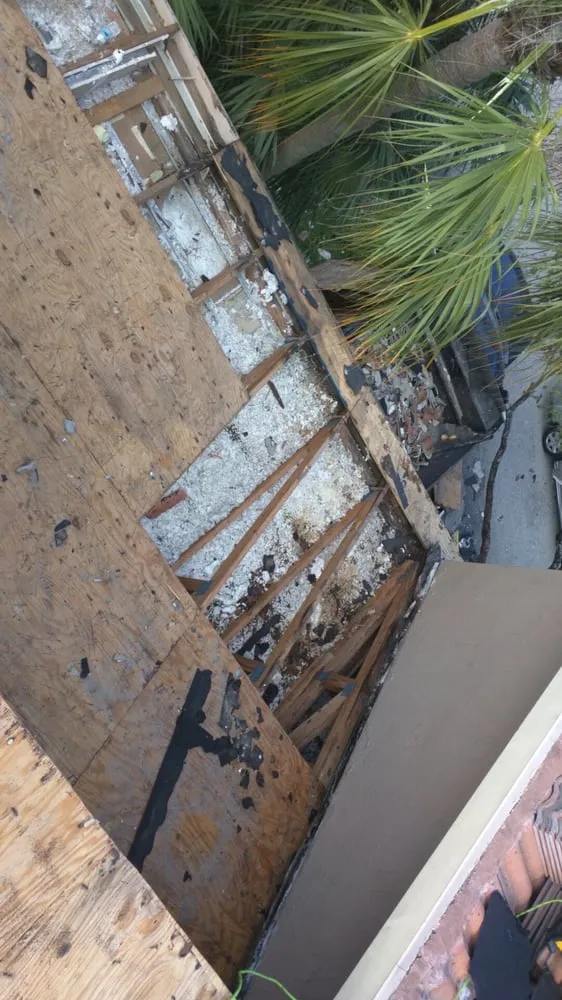 Slide of Riggs Roofing