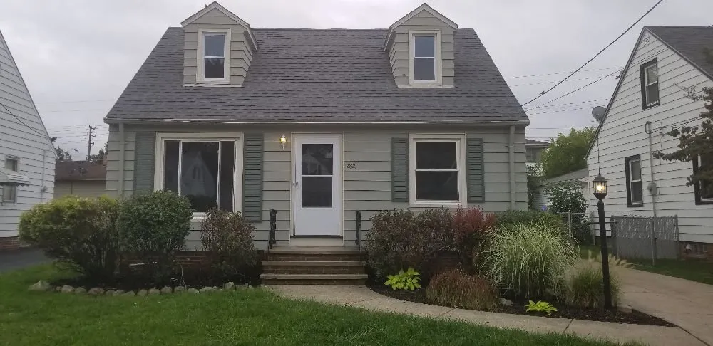 Slide of Right Guys Roofing