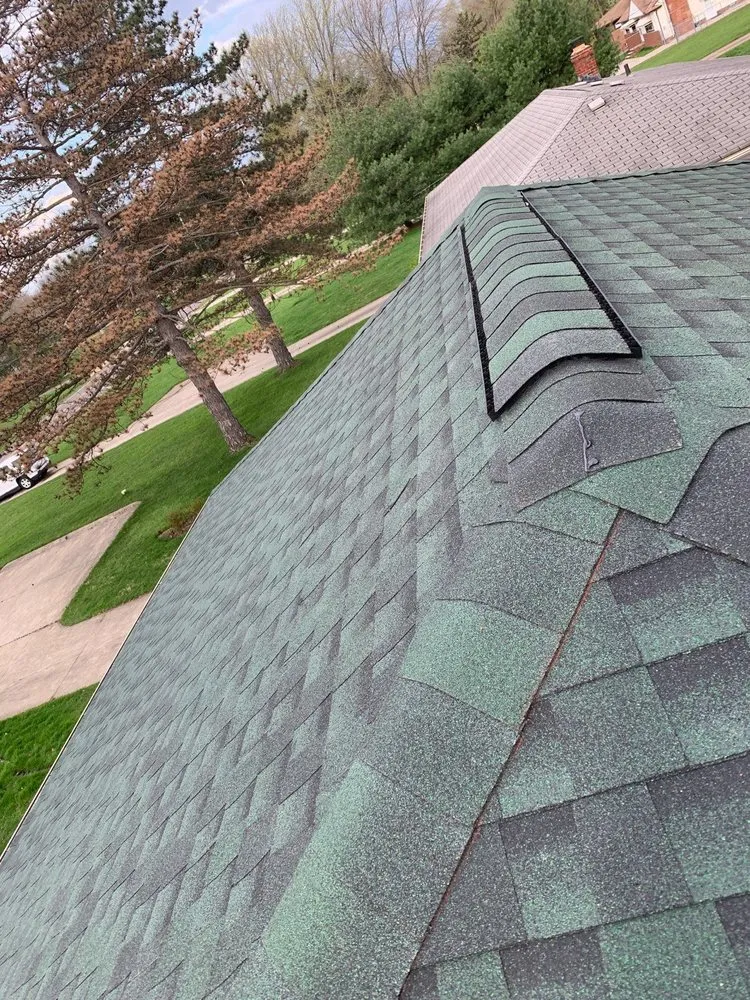 Slide of Right Guys Roofing