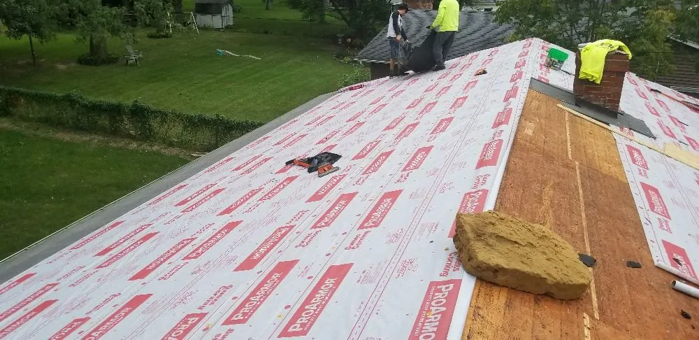 Slide of Right Guys Roofing