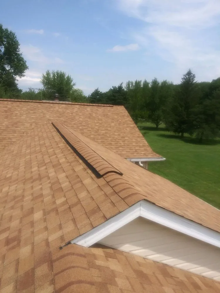 Slide of Right Guys Roofing