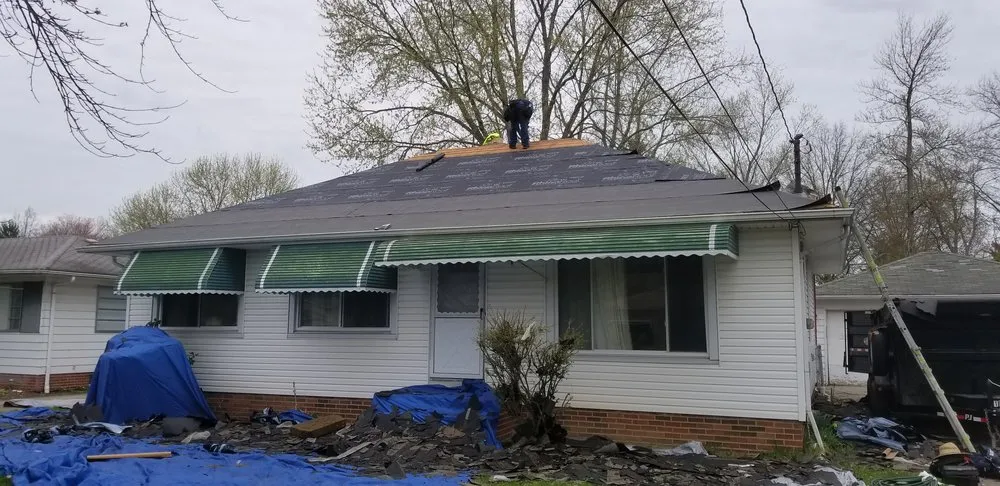 Slide of Right Guys Roofing