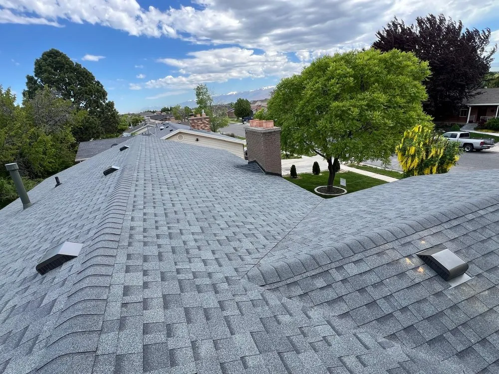 Slide of Rigo's Roofing Company