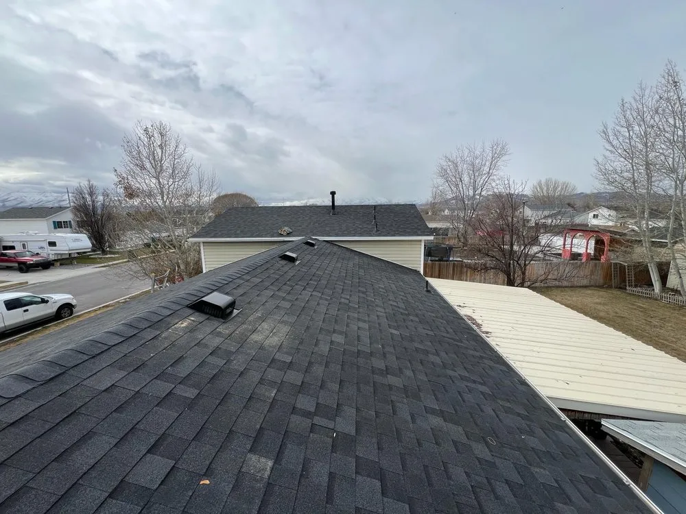 Slide of Rigo's Roofing Company