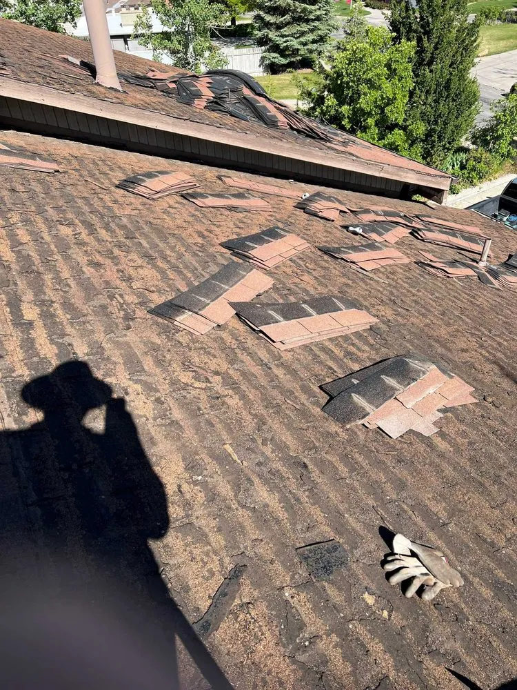 Slide of Rigo's Roofing Company