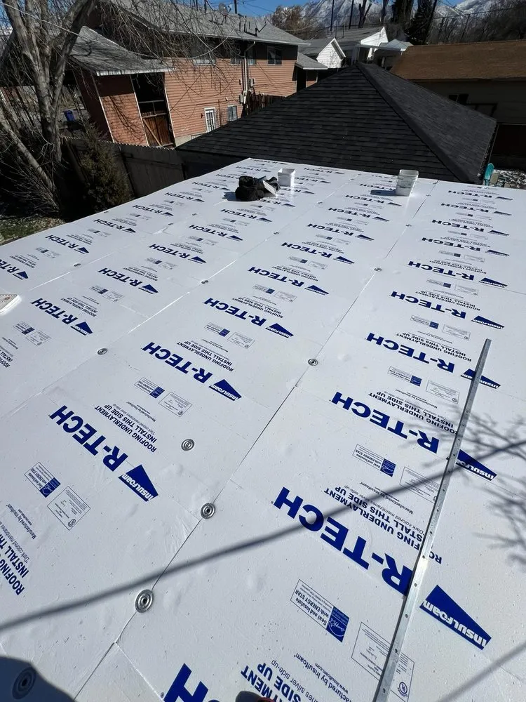 Slide of Rigo's Roofing Company