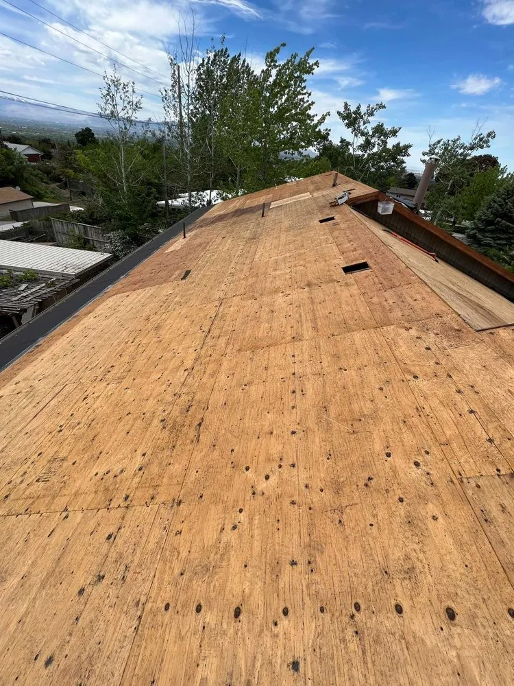 Slide of Rigo's Roofing Company