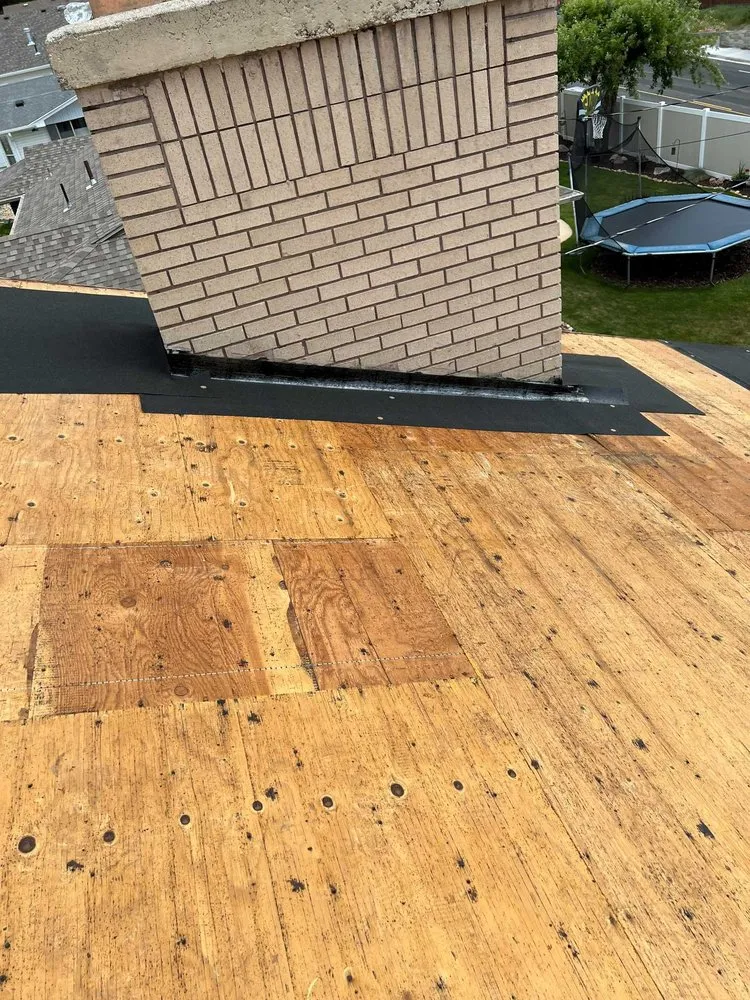 Slide of Rigo's Roofing Company