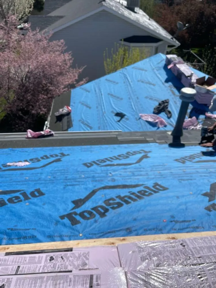 Slide of Rigo's Roofing Company