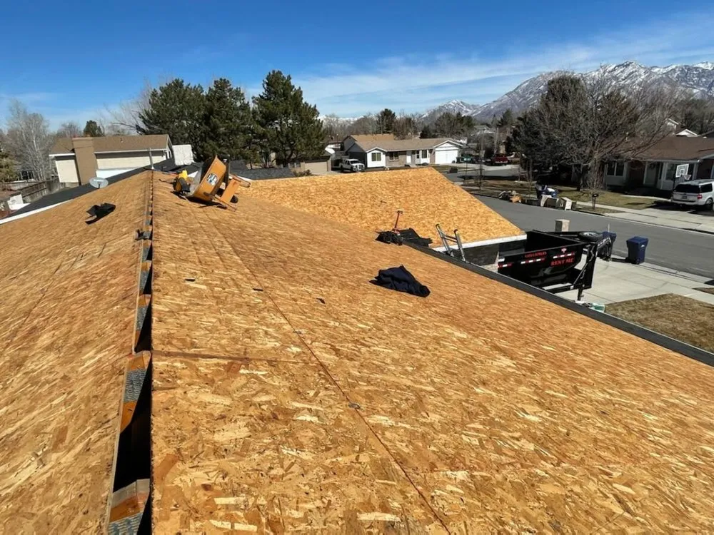 Slide of Rigo's Roofing Company