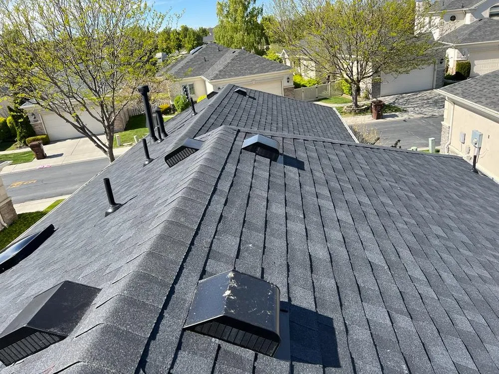 Slide of Rigo's Roofing Company