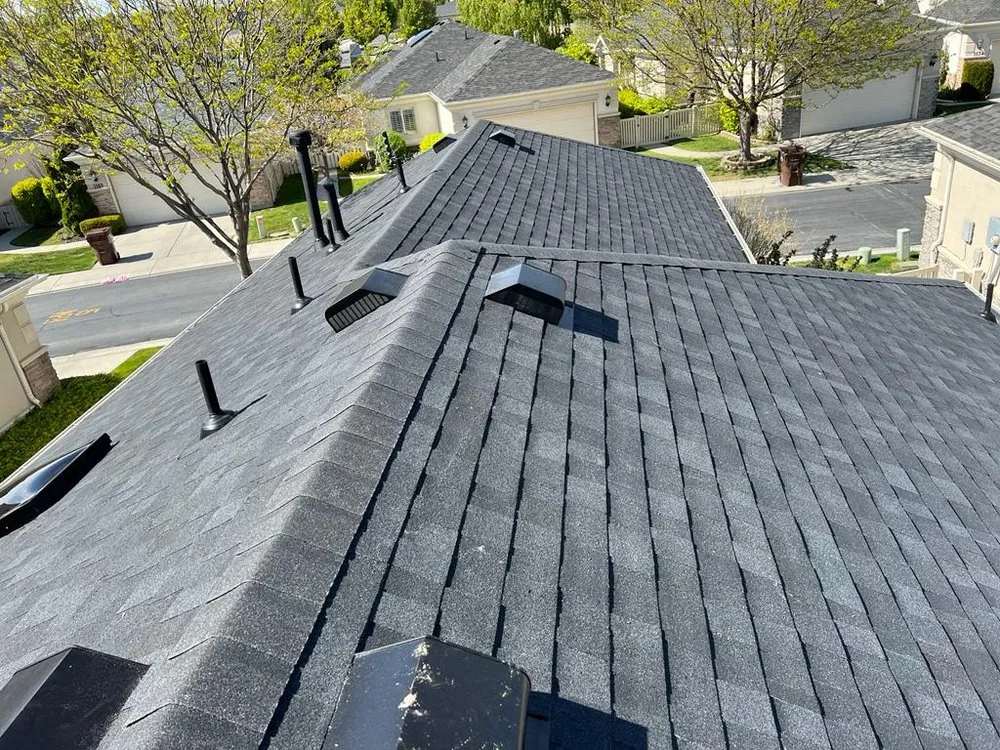 Slide of Rigo's Roofing Company