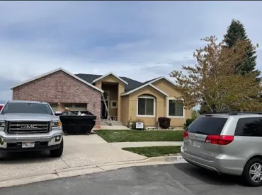 Slide of Rigo's Roofing Company