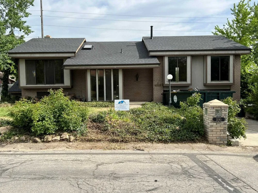 Slide of Rigo's Roofing Company