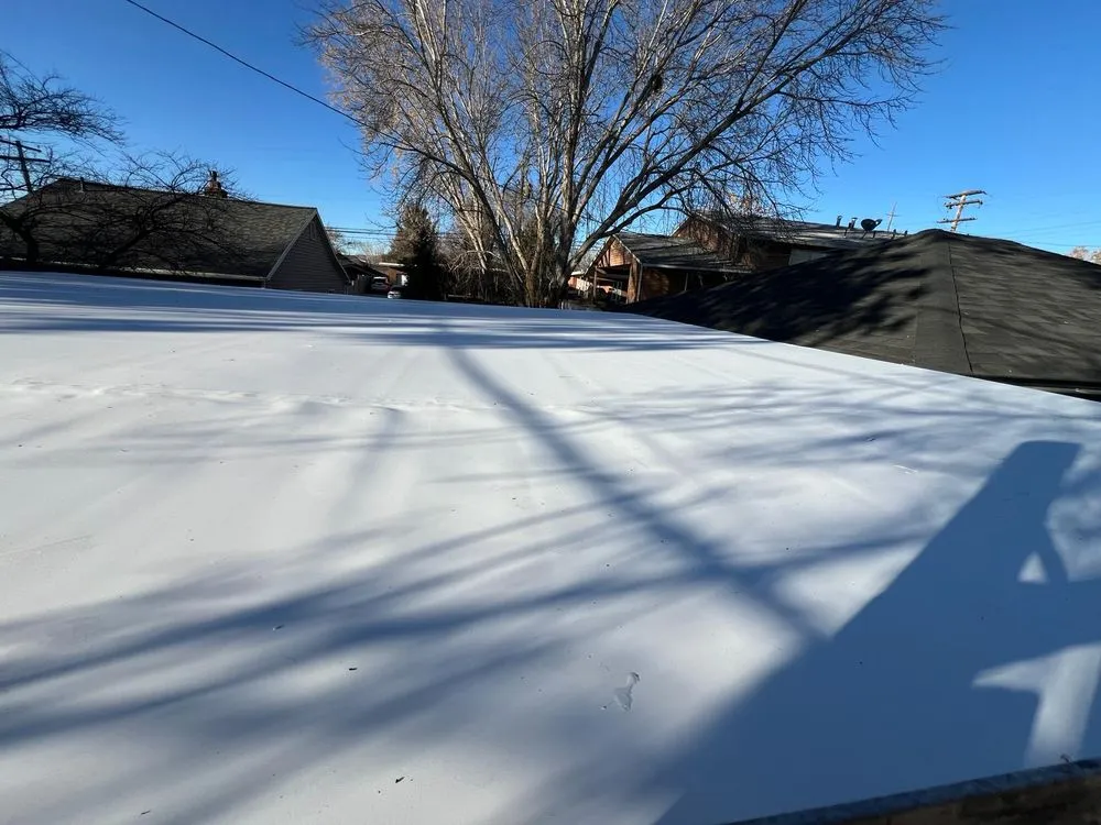 Slide of Rigo's Roofing Company