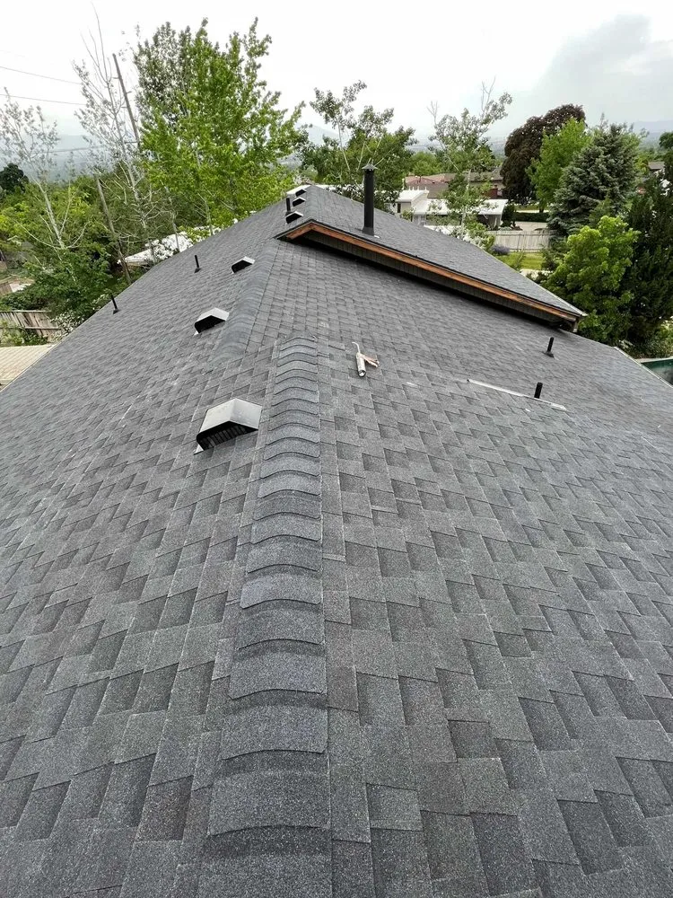 Slide of Rigo's Roofing Company