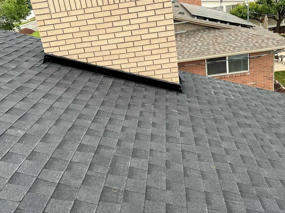 Slide of Rigo's Roofing Company