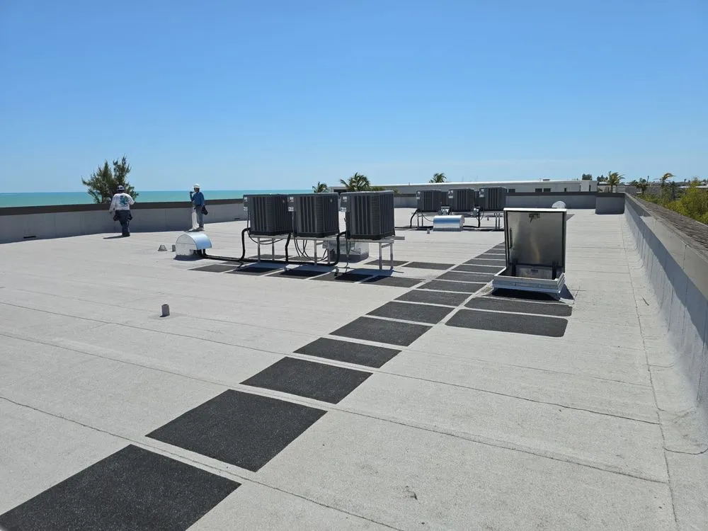 Slide of Rigos Roofing Installers