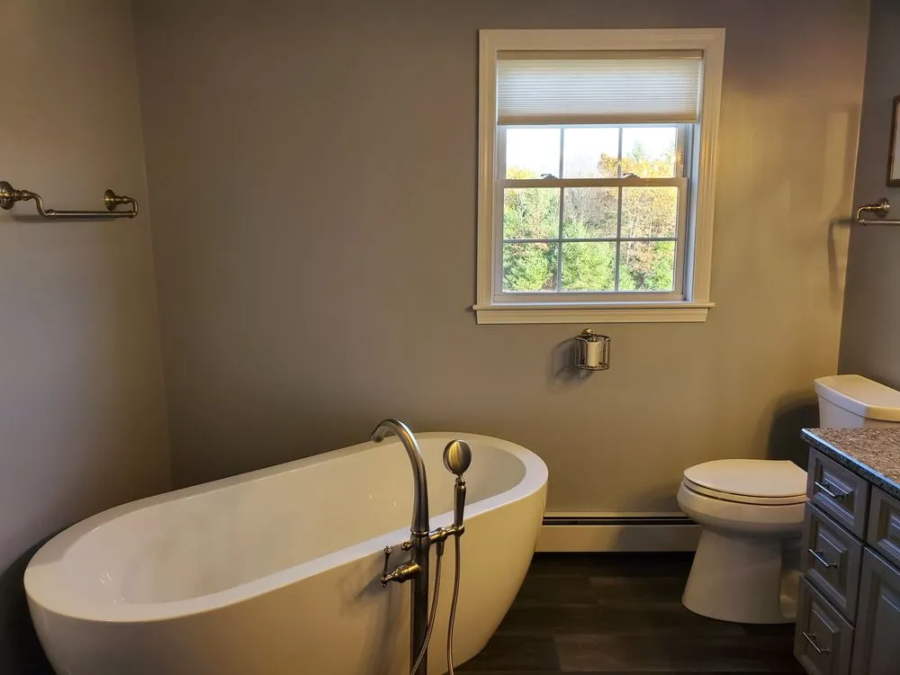 Slide of RIHI The Home Improvement Specialist