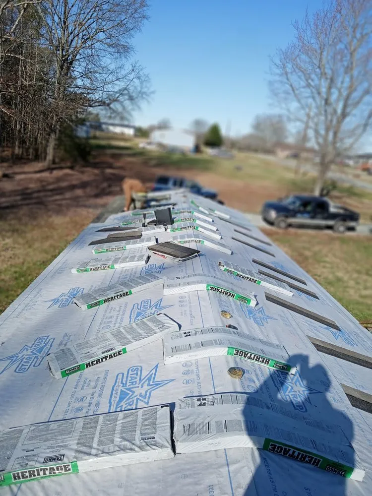 Slide of Riley Roofing Company