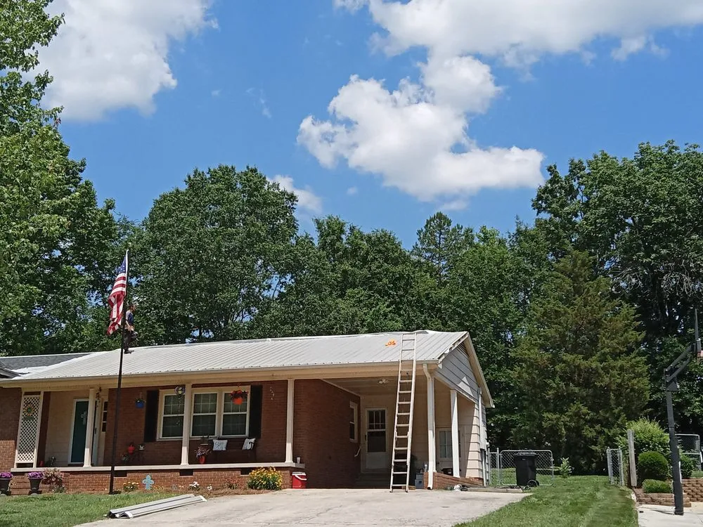 Slide of Riley Roofing Company