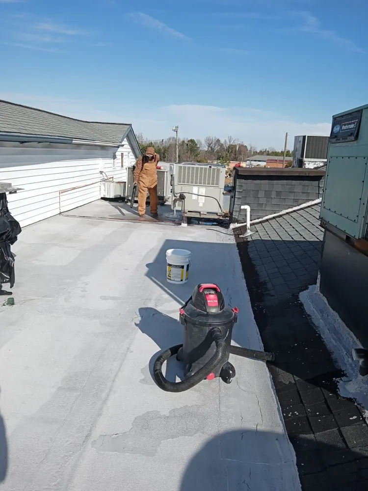 Slide of Riley Roofing Company