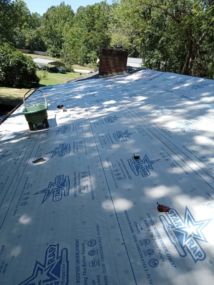 Slide of Riley Roofing Company