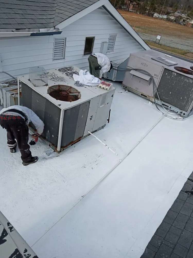 Slide of Riley Roofing Company