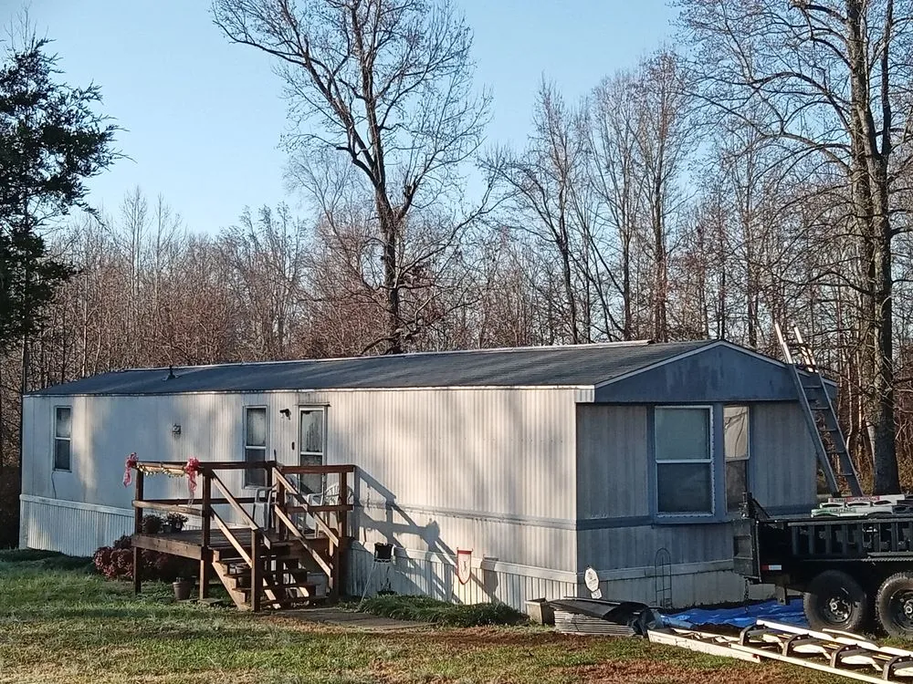Slide of Riley Roofing Company