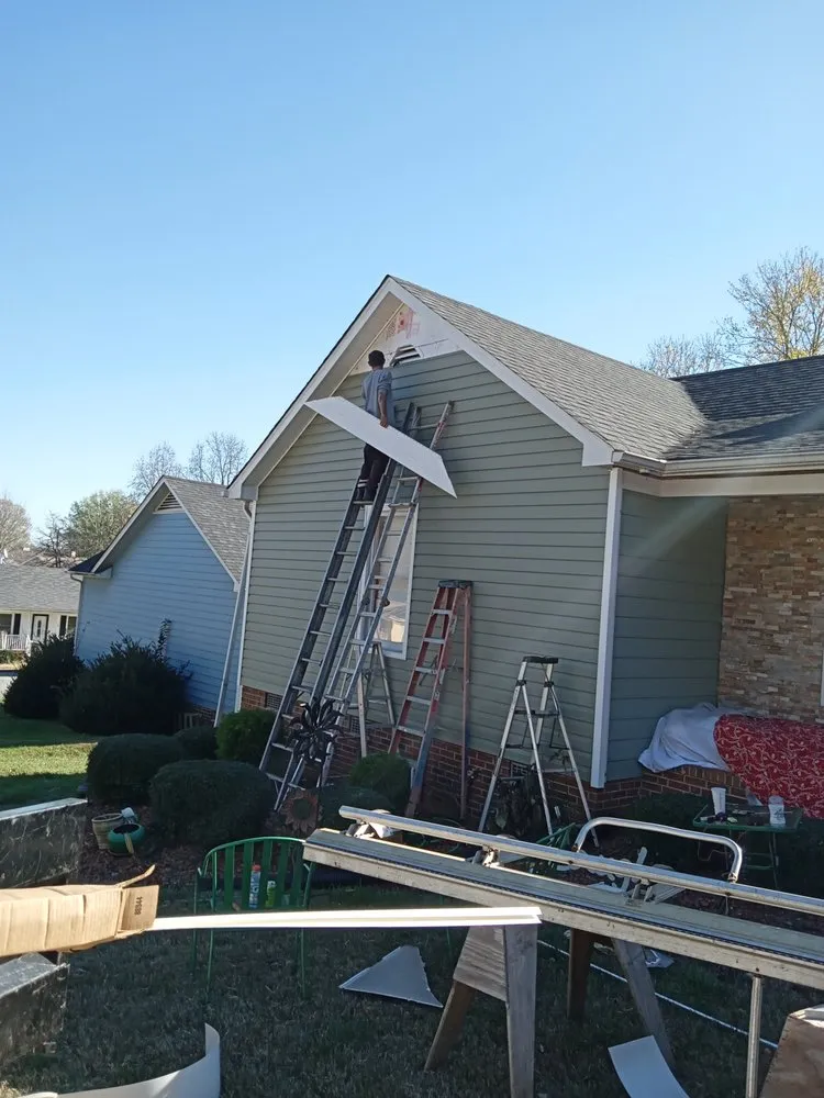 Slide of Riley Roofing Company