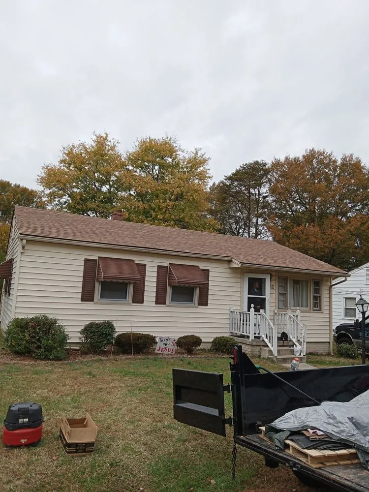 Slide of Riley Roofing Company
