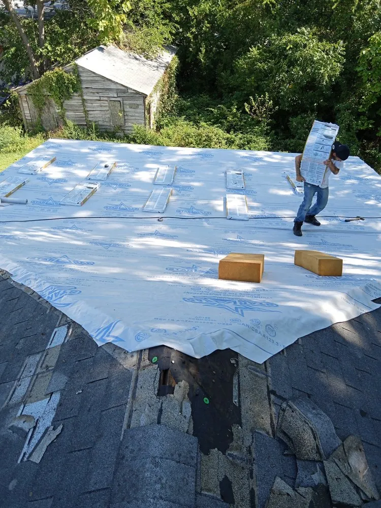 Slide of Riley Roofing Company