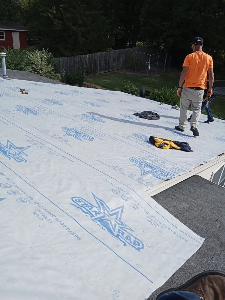 Slide of Riley Roofing Company