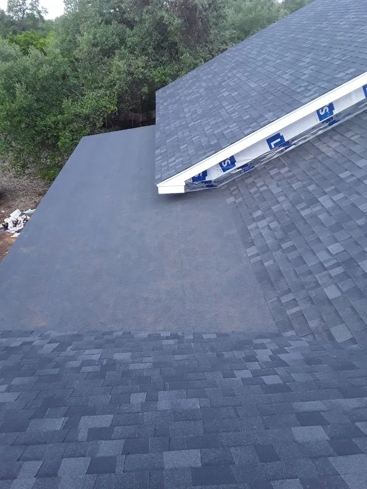 Professional roof replacement for residential properties in Spicewood, TX by Riley-Sons Roofing and Construction