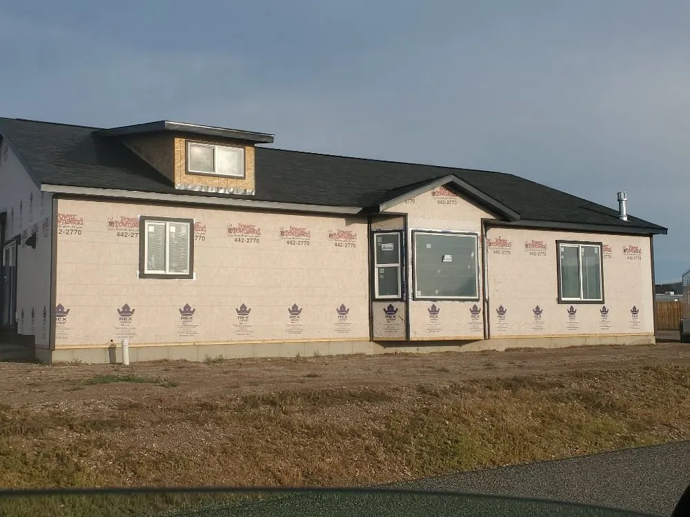 Slide of Rileys Roofing General Construction