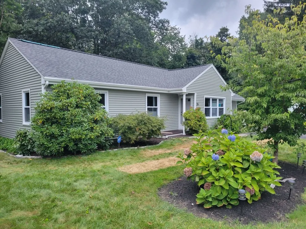 Slide of Rinaldi Roofing