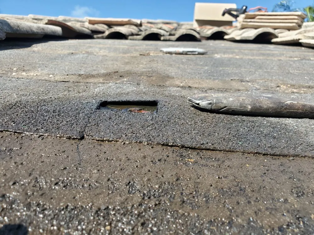 Slide of Rip Tide Roofing
