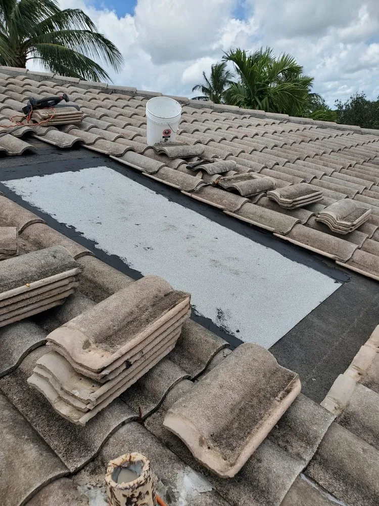 Slide of Rip Tide Roofing