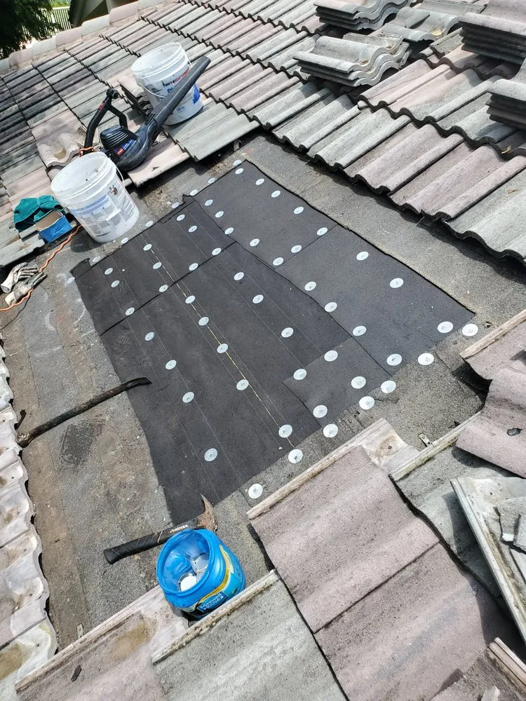 Slide of Rip Tide Roofing