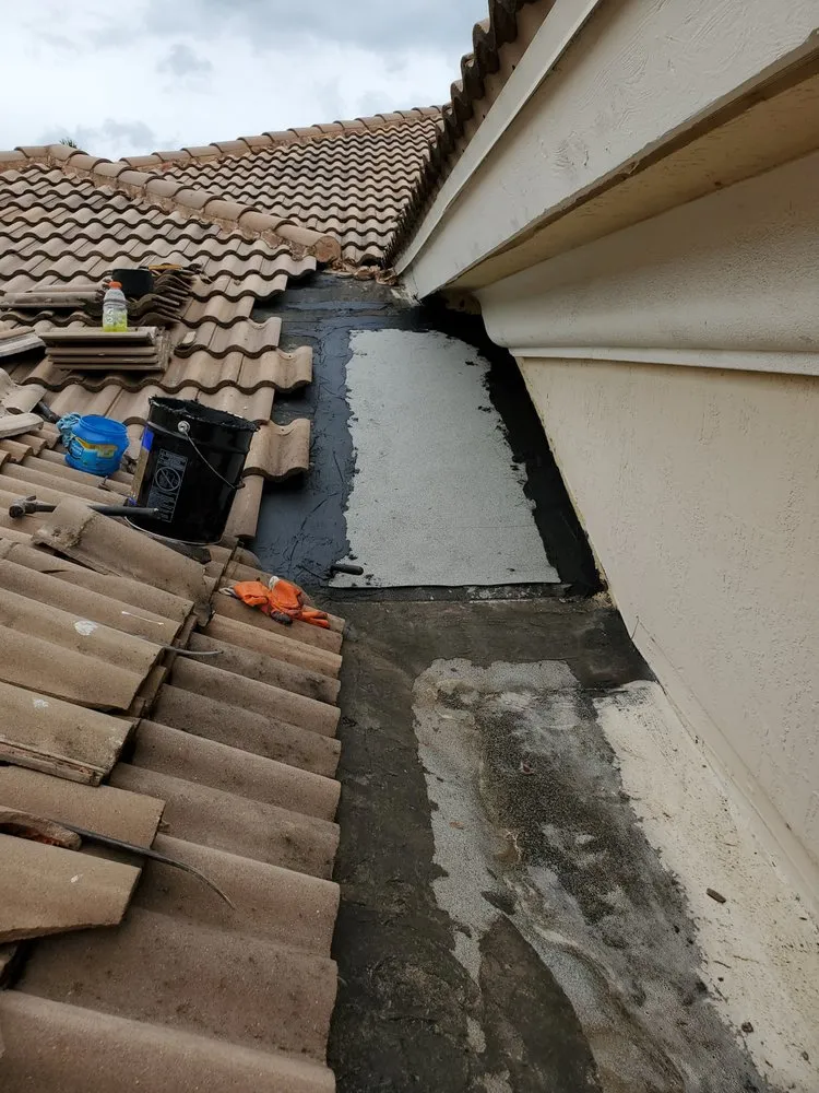 Slide of Rip Tide Roofing