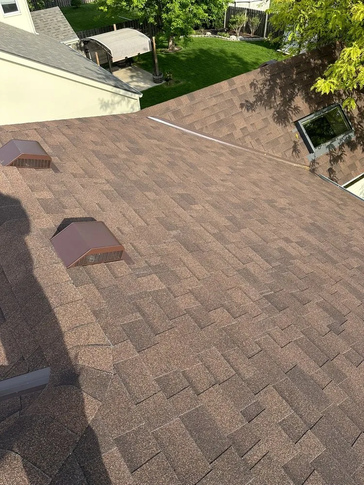 Slide of Rise Above Roofing