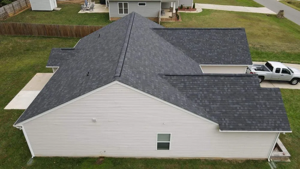 Slide of RISE Roofing & Restoration