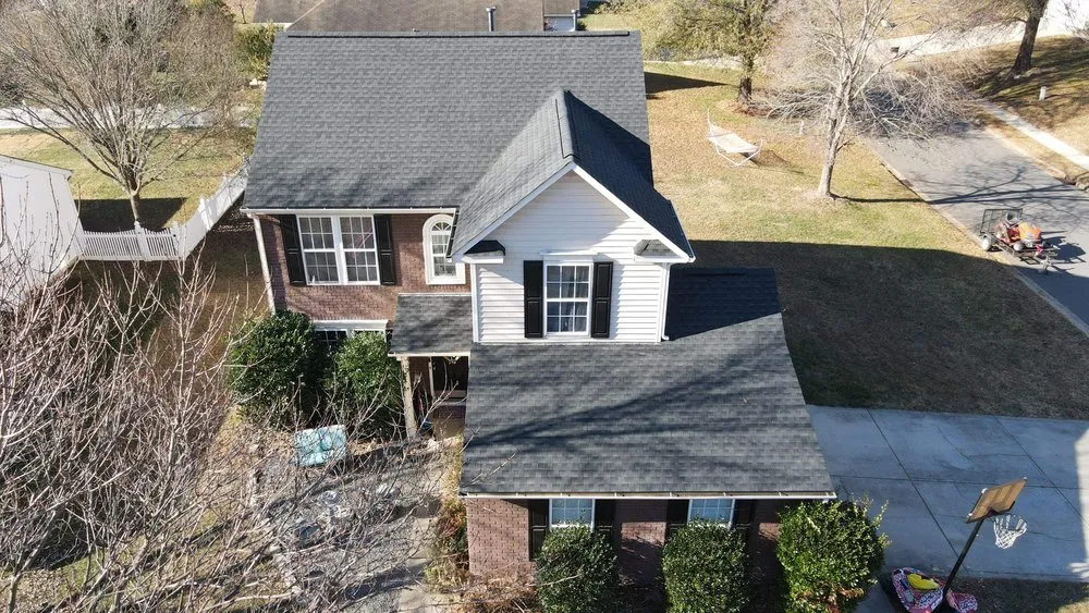 Slide of RISE Roofing & Restoration