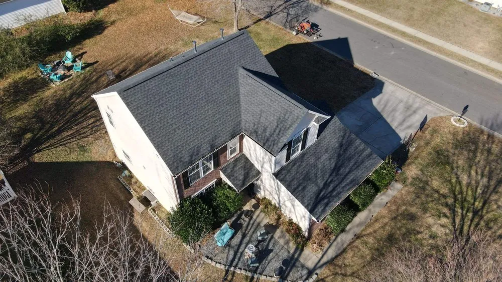 Slide of RISE Roofing & Restoration