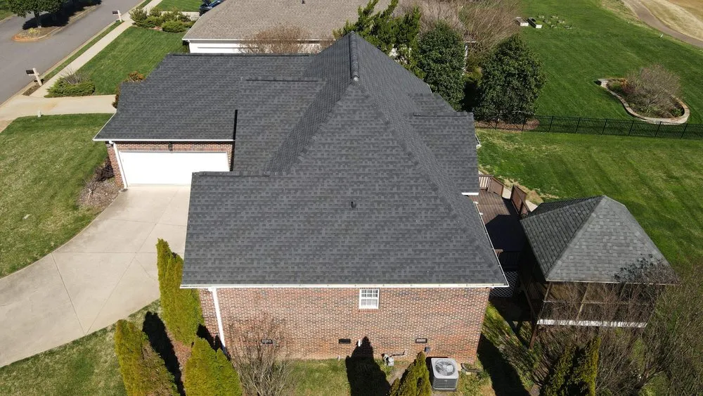 Slide of RISE Roofing & Restoration