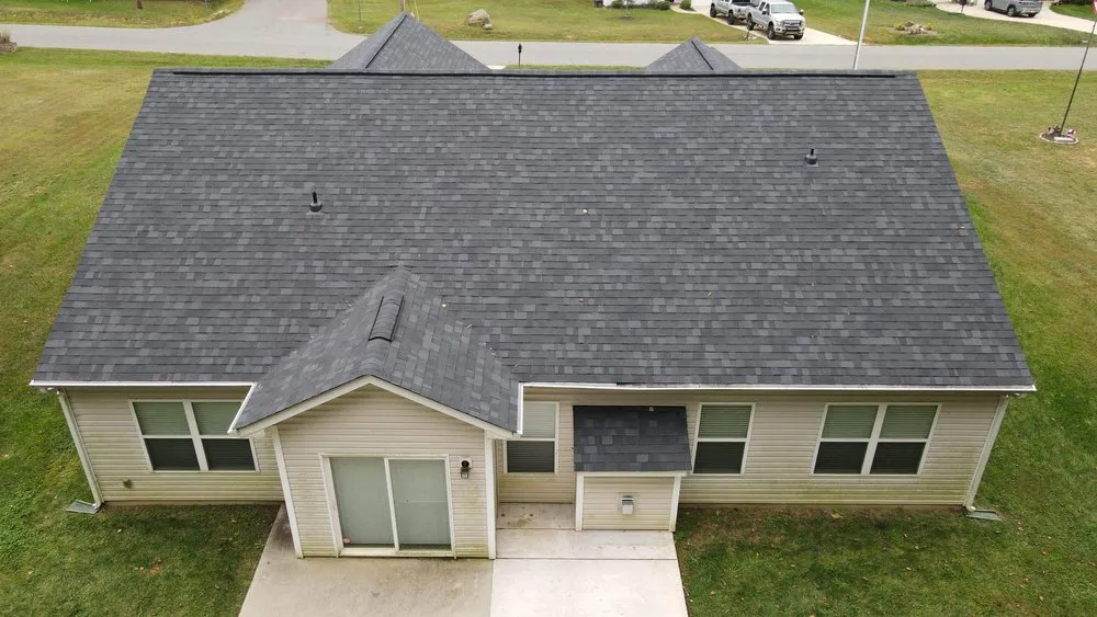 Slide of RISE Roofing & Restoration