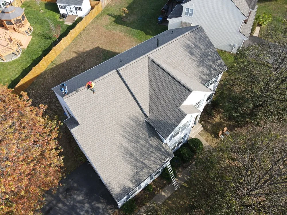 Slide of Rise Roofing